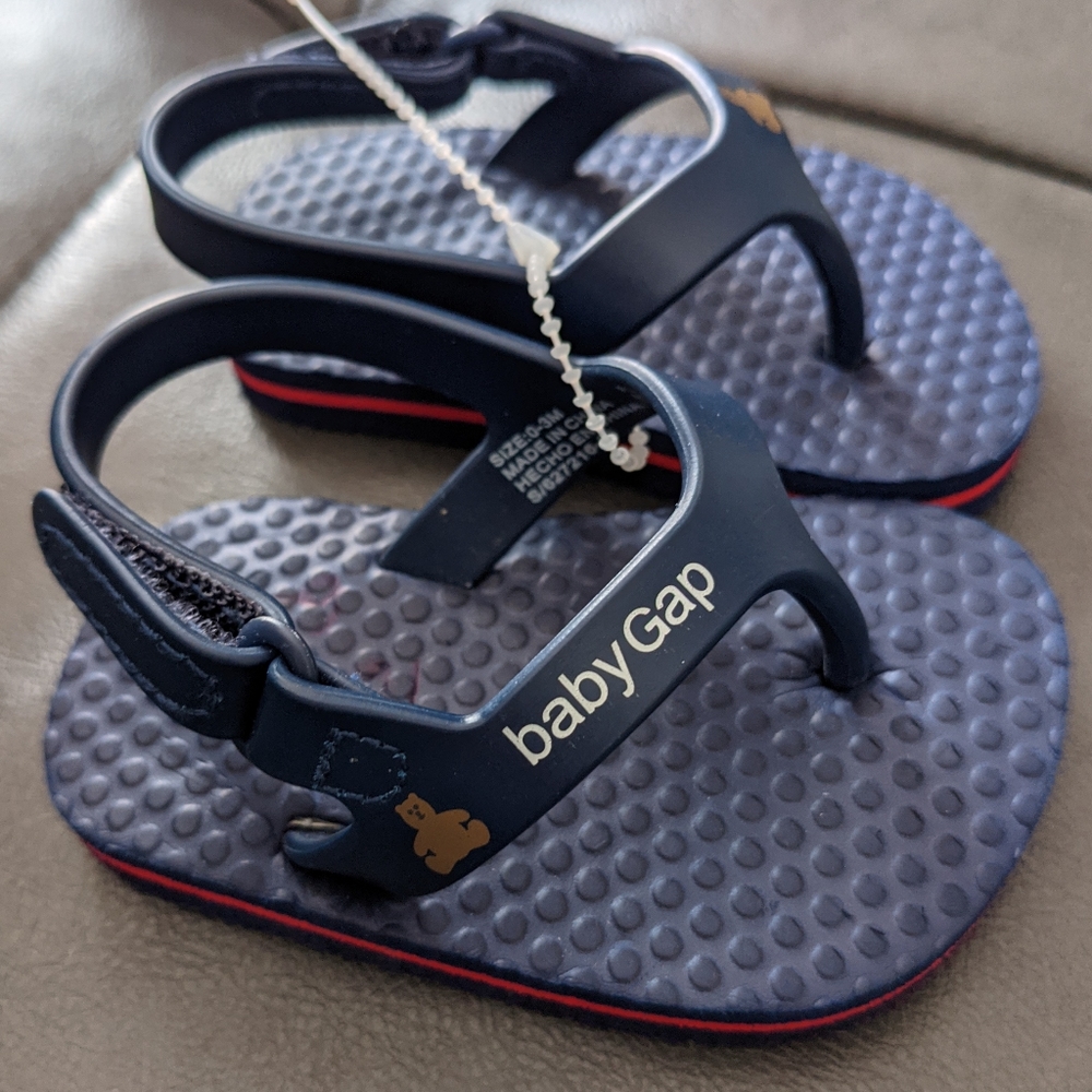 **3/$25**Baby Gap navy blue flip flops